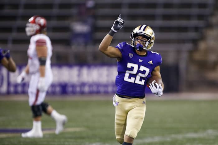 Washington cornerback Trent McDuffie celebrates interception